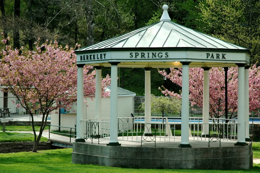 The gazebo at Berkeley Springs State Park framed by spring blossoms